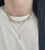 Cross Diamond Necklace on neck