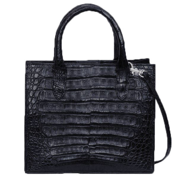 Stunning Exotic Genuine Crocodile Cross Body Handbag from the exclusive Coly collection features a removable longer strap, protective Silvertone feet, soft leather interior, magnetic closure, and two inside pockets. Dimensions are 9"W x 7.5"H x 4"D. Handmade in Los Angeles.
