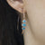 Opal and Diamond Hoop Earrings on model