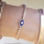 Multi Eye Diamond and Lapis Tennis Bracelet on model