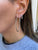 Small Pave Diamond Hoop Earrings on model
