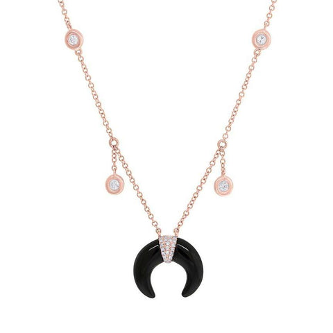 Trendy Diamond and Onyx Tusk necklace. Made with 14 karat rose gold in Los Angeles. Horn made with Onyx stone.